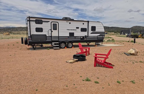 Penrose House | Large Planet Camper - Roomy planet-themed camper for groups, sleeps six