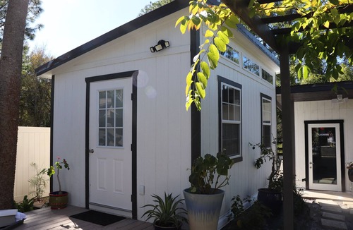 Westchase House | Luxury 1-bedroom cottage with pool in prime location. Peaceful resort style.