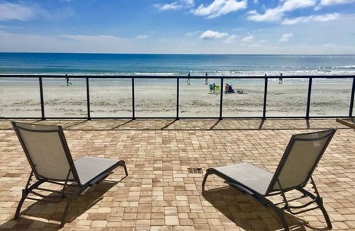 Volusia County Condo | Luxury Oceanfront Sky Home Retreat – available for SPEED WEEK! NO DRIVE BEACH