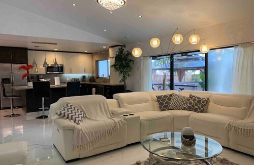 Florida Gardens House | Luxury Pool Home Hot Tub + Outdoor Cinema Near West Palm Beach