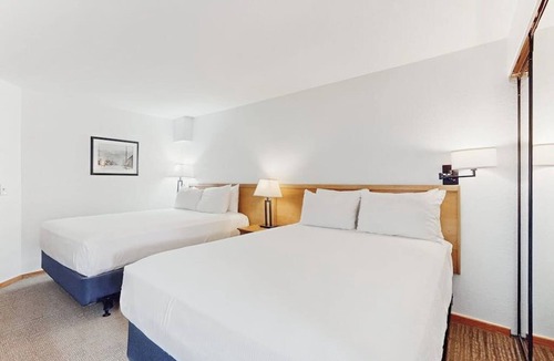 West End Cabin | Main St. room - pool & hot tub - walk to lifts, dog-friendly, balcony