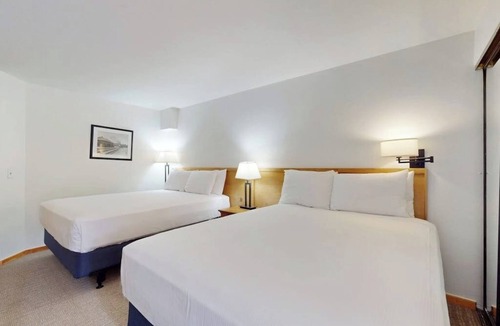 West End Cabin | Main St. studio - pool & hot tub - walk to lifts, dog-friendly, private balcony