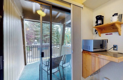 West End Cabin | Main Street gem - pool & hot tub - walk to lifts, dog-friendly, balcony