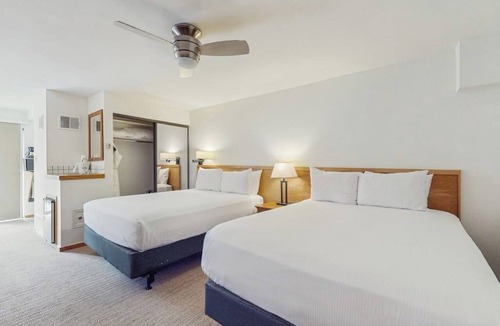 West End Cabin | Main Street stay - pool & hot tub - walk to lifts, dog-friendly, balcony