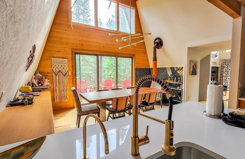 Blue River House | Mid Century Glam Chalet in the Woods with Hot Tub!