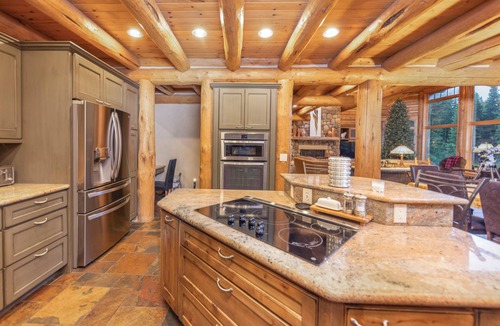 Breckenridge House | NEW LISTING! Luxury log home, nearby shuttle, hot tub, game tables, several sound systems, views!