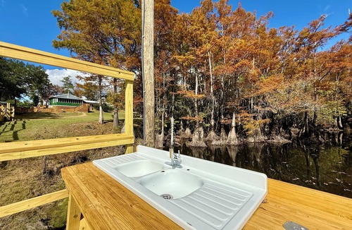 Bristol Cottage | New listing! Waterfront with dock, boat ramp! Surrounded by tupelo & cypress!
