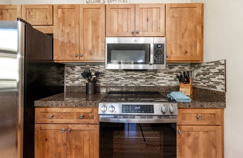 Lakeside Village Condo | New modern condo. Hot tub. Bike path. On Bus Route