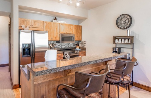 Lakeside Village Condo | New modern condo. Hot tub. Bike path. On Bus Route