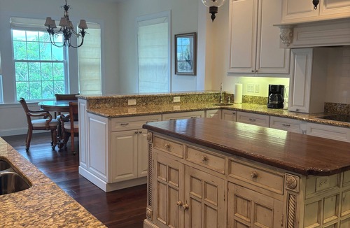 Palm Island House | NEW! Palm Island with private pool, garage, screened porches, dock, 2 kayaks