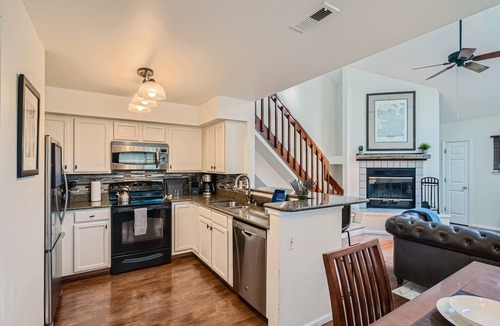 Meadow Hills Condo | New! Urban Oasis - Pool Access - Fireplace - 31 Day Rental