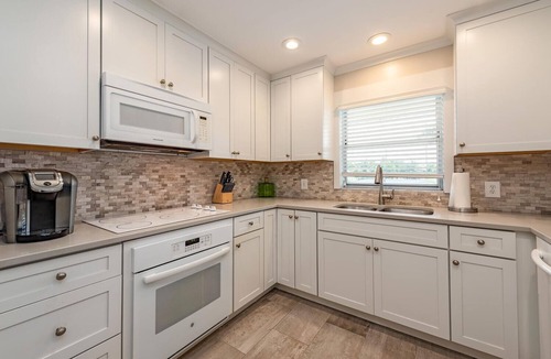 Royal Harbor Condo | Newly renovated Waterfront condo with new heated pool and dock