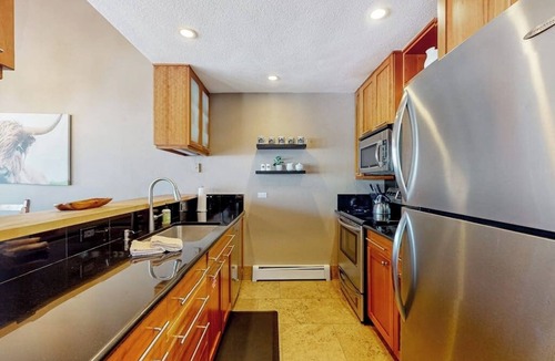 Vail House | Scenic, three-story townhome near all-season recreation with fireplace & grill