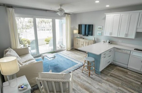 Gulf Place Condo | Steps to the beach!