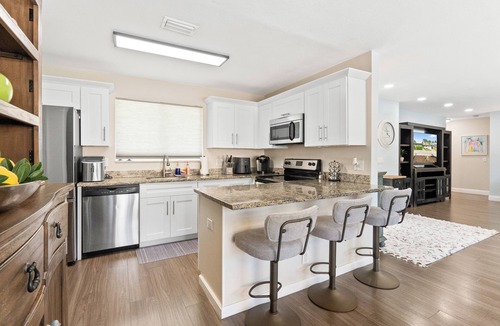 Golfview Harbor House | Stunning Waterfront 3 bedroom, 2 bathroom Home with Pool- 5 min from Beach