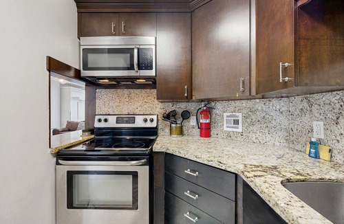 Galt Mile Condo | Sunlit suite with a city view & fast WiFi plus a pool, & beach access
