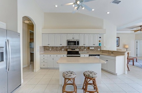 Yacht Club Villa | The Hammock - Beautiful Gulf access - 4 bedroom home - with heated pool