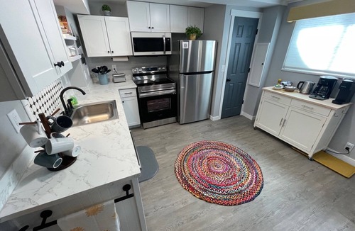 Sandy House | THE HIDEAWAY: Charming, 2-bedroom apartment near ski slopes & Wasatch Mountains.