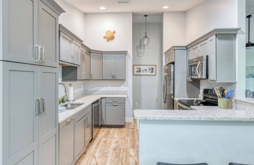 Butler Beach House | Tiki Time - Pool & Heated Spa, Wonderful Backyard Space, Near the Beach!