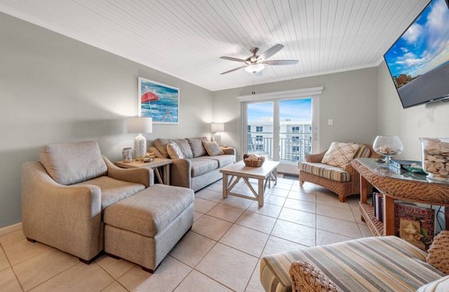 New Smyrna Beach Condo | Top-floor 2/2 condo with ocean and pool views, private balcony, and heated beachfront pool