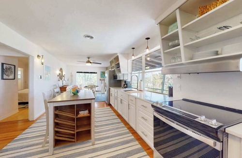 Palm Island House | Tropical Palm Island home steps from the beach with grill, outdoor shower, dock