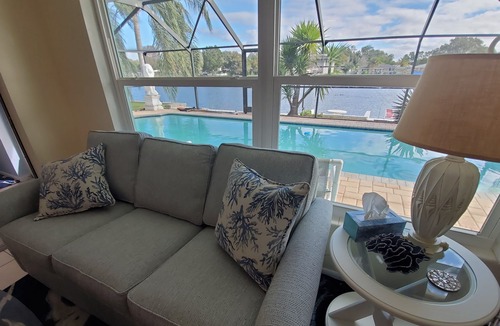 Jasmine Lakes House | Tropical Waterfront HEATED Pool/SPA Home by 9 BEACHES & 9 STATE PARKS SLEEPS 11