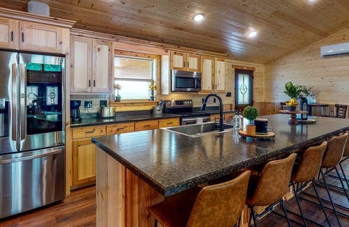 Stringtown House | Two adjacent cabins - channel access, kayaks, canoe & firepit - dog-friendly