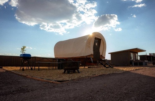 Colorado City RV Rental | Unique Covered Wagon Glamping with Shared Sauna