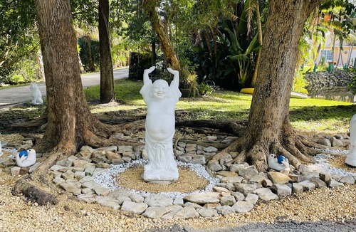 Palm Springs House | Unwind Island: 5-acre WPB lake oasis w/private backyard, swim spa & kayaks!