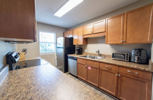 Holiday Beach House | Walking Distance to the Beach 2BR townhome in PCB Perfect for families with kids