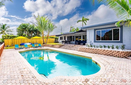Poinsettia Heights House | Waterfront Heated Pool Home Game & 6 min Beach