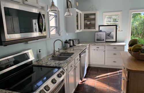 Southside House | West Palm Beach- Mediterranean Estate -Heated Pool -6 bedrooms/4 bath- Sleeps 14