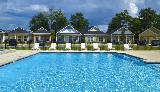 100 Riverstone Way . with Amazing Amenities!