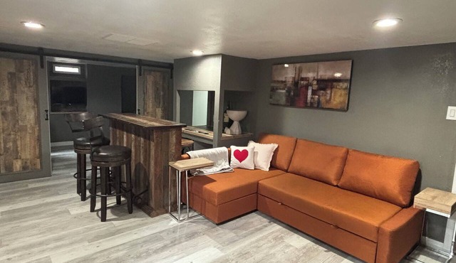 3-bedroom house in charming Greeley with AC. Backyard fire pit and covered patio