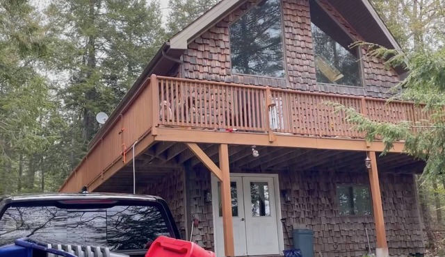 Beautiful beachfront chalet with southern exposure on Green Lake,Dedham, Maine. in Dedham