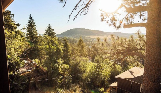 Built in 1908 this historic cabin is full of original charm with a penthouse view. Step inside and you are immediately greeted by a full unobstructed view of Elephant Rock. Sleeping up to 9 people.