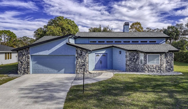 Four Beds, three baths, heated pool, and a Golf Course. What more do you need! in Spring Hill