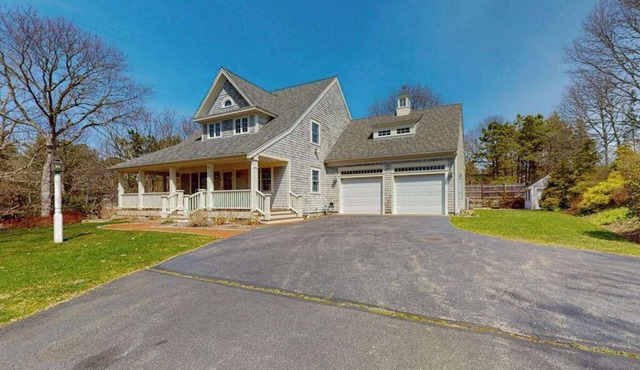 Idyllic home on half-acre with amazing location, 3 living areas, central AC, W/D in Cotuit