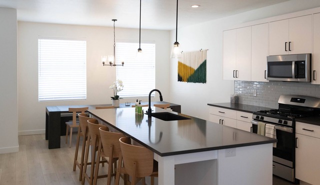 NEW American Fork 4 BD Townhome. Centrally located with fun game room!