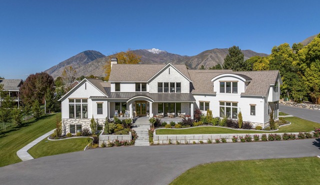 New resort-style vacation property with ponds, pool, sport court and theater