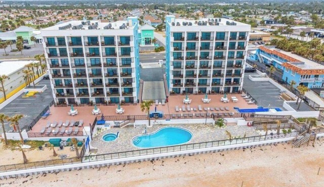 Oceanfront 1BR Escape | Balcony + Pool | Sleeps 4