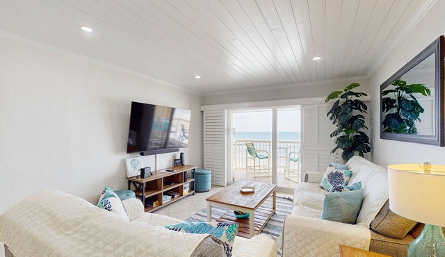 Oceanfront , upscale, oceanfront condo with Olympic pool & beach access in New Smyrna Beach