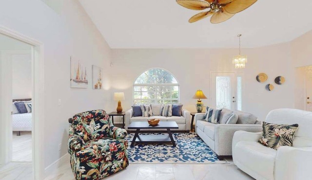 Peaceful home with pool, patio, lanai, TV & fitness room - snowbird-friendly