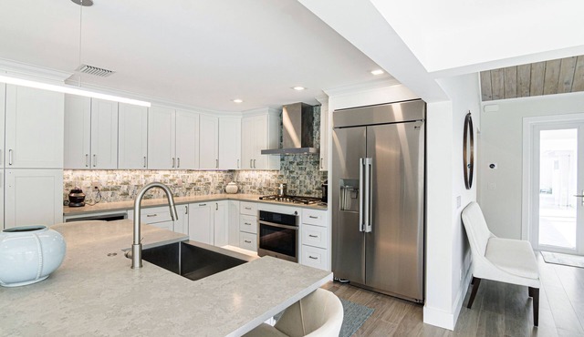 Private pool home in gated community at beach totally renovated "salty modern " in Jupiter