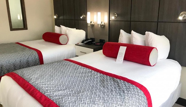 Ramada by Wyndham Suites Orlando Airport- Free Airport Shuttle in Orlando