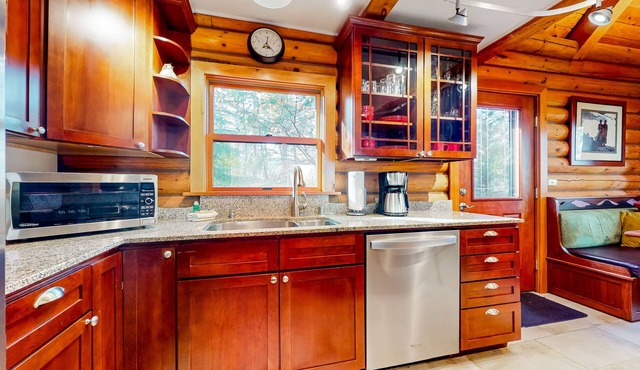 Rustic waterview home, covered deck, vaulted ceilings & updated kitchen in Oak Harbor