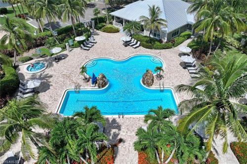 Spacious 2BR Lely Resort Condo with Lake View steps to Pool Hot Tub Gym