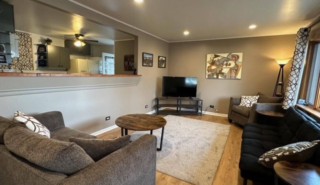 Spanish décor w/modern twist & fenced yard in Downers Grove