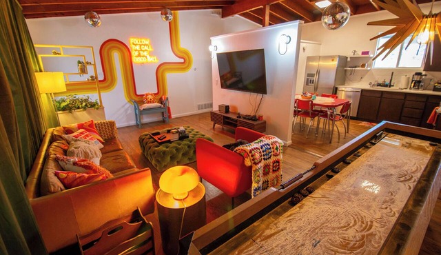 The Disco Den -> Hot Tub Shuffleboard Fire Pit