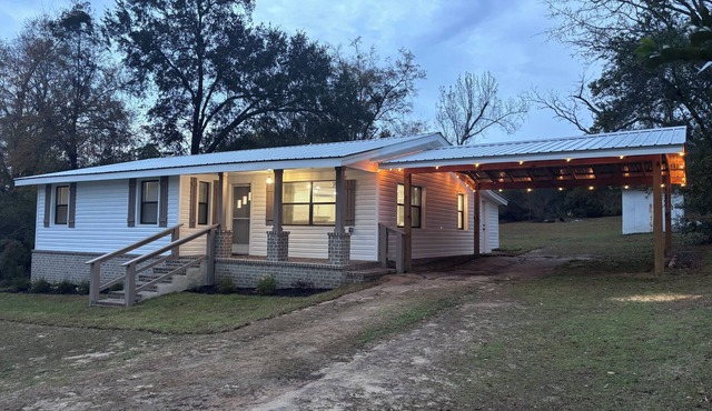 The Happy Place, a Charming & Cozy 3-bedroom home in the heart of Sneads, FL.